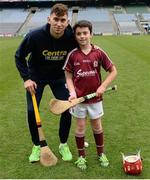 8 October 2016; Galway hurler Jason Flynn with Liam Kenneally, age 10, from Athenry in Galway, as Croke Park today played host to some of Ireland’s most talented hurlers, along with over 500 children, who lined-out to learn tips and skills from their hurling heroes as part of Centra’s Live Well hurling initiative. The participating children, who experienced a once in a lifetime opportunity, came from 12 lucky GAA clubs who each claimed their very special spot by winning a Live Well hurling challenge during the summer. Croke Park, Dublin. Photo by Piaras Ó Mídheach/Sportsfile