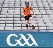 8 October 2016; Darragh Furlong, age 12, from the Adamstown GAA Club, Co Wexford, jumps back onto the pitch after retrieving sliotars from the seats at Croke Park today which played host to some of Ireland’s most talented hurlers, along with over 500 children, who lined-out to learn tips and skills from their hurling heroes as part of Centra’s Live Well hurling initiative. The participating children, who experienced a once in a lifetime opportunity, came from 12 lucky GAA clubs who each claimed their very special spot by winning a Live Well hurling challenge during the summer. Croke Park, Dublin. Photo by Cody Glenn/Sportsfile
