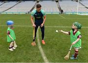 8 October 2016; Wexford hurler Lee Chin with Odhran Burke-Keaveney, left, and James Burke, both age 5, from Athenry in Galway as Croke Park today played host to some of Ireland’s most talented hurlers, along with over 500 children, who lined-out to learn tips and skills from their hurling heroes as part of Centra’s Live Well hurling initiative. The participating children, who experienced a once in a lifetime opportunity, came from 12 lucky GAA clubs who each claimed their very special spot by winning a Live Well hurling challenge during the summer. Croke Park, Dublin. Photo by Piaras Ó Mídheach/Sportsfile