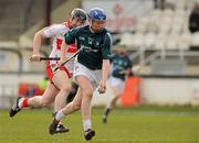 20 February 2011; David Harney, Kildare, in action against Conor Quinn, Derry. Allianz Hurling League, Division 3A Round 2, Kildare v Derry, St Conleth's Park, Newbridge, Co. Kildare. Picture credit: Barry Cregg / SPORTSFILE