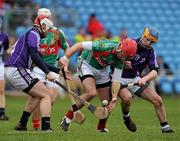 20 February 2011; Derek McDonnell, Mayo, in action against David Markey, left, and Dermot Vaughan, Fingal. Allianz Hurling League, Division 3B Round 2, Mayo v Fingal,  McHale Park, Castlebar, Co. Mayo. Picture credit: Brian Lawless / SPORTSFILE