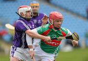 20 February 2011; Derek McDonnell, Mayo, in action against Peter Coyne, Fingal. Allianz Hurling League, Division 3B Round 2, Mayo v Fingal,  McHale Park, Castlebar, Co. Mayo. Picture credit: Brian Lawless / SPORTSFILE