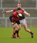 20 February 2011; Martin Clarke, Down, in action against Joe Bergin, Galway. Allianz Football League, Division 1 Round 2, Down v Galway, Pairc Esler, Newry, Co. Down. Photo by Sportsfile