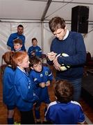 8 October 2016; Kevin Kilbane, Aviva’s FAI Junior Cup Ambassador, paid a trip to Manulla FC to present them with a squad signed Republic of Ireland framed jersey and €1,500 worth of kit and equipment as part of Aviva’s continued support of Junior football clubs through their sponsorship of the FAI Junior Cup. Pictured is former Republic of Ireland player Kevin Kilbane sigining autographs for a group of young Manulla FC players. Manulla FC in Manulla, Co Mayo. Photo by Sam Barnes/Sportsfile
