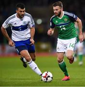 8 October 2016; Stuart Dallas of Northern Ireland in action against Marco Berardi of San Marino during the FIFA World Cup Group C Qualifier match between Northern Ireland and San Marino at Windsor Park in Belfast. Photo by David Fitzgerald/Sportsfile