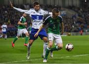 8 October 2016; Shane Ferguson of Northern Ireland in action against Jose Hirsch of San Marino during the FIFA World Cup Group C Qualifier match between Northern Ireland and San Marino at Windsor Park in Belfast. Photo by David Fitzgerald/Sportsfile