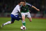8 October 2016; Shane Ferguson of Northern Ireland in action against Jose Hirsch of San Marino during the FIFA World Cup Group C Qualifier match between Northern Ireland and San Marino at Windsor Park in Belfast. Photo by David Fitzgerald/Sportsfile