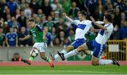 8 October 2016; Jamie Ward of Northern Ireland in action against  Matteo Vitaioli and Davide Simoncini of San Marino during the FIFA World Cup Group C Qualifier match between Northern Ireland and San Marino at Windsor Park in Belfast. Photo by Oliver McVeigh/Sportsfile