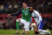 8 October 2016; Kyle Lafferty of Northern Ireland in action against Alessandro Della Valle of San Marino during the FIFA World Cup Group C Qualifier match between Northern Ireland and San Marino at Windsor Park in Belfast. Photo by David Fitzgerald/Sportsfile