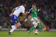8 October 2016; Steven Davis of Northern Ireland in action against Mattia Stefanelli of San Marino during the FIFA World Cup Group C Qualifier match between Northern Ireland and San Marino at Windsor Park in Belfast. Photo by David Fitzgerald/Sportsfile