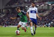 8 October 2016; Jamie Ward of Northern Ireland in action against Luca Tosi of San Marino during the FIFA World Cup Group C Qualifier match between Northern Ireland and San Marino at Windsor Park in Belfast. Photo by David Fitzgerald/Sportsfile