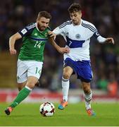 8 October 2016; Stuart Dallas of Northern Ireland in action against Matteo Vitaloli of San Marino during the FIFA World Cup Group C Qualifier match between Northern Ireland and San Marino at Windsor Park in Belfast. Photo by David Fitzgerald/Sportsfile