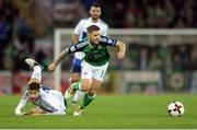 8 October 2016; Oliver Norwood of Northern Ireland in action against Marco Berardi of San Marino during the FIFA World Cup Group C Qualifier match between Northern Ireland and San Marino at Windsor Park in Belfast. Photo by Oliver McVeigh/Sportsfile