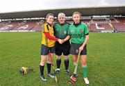 20 February 2011; Referee Eamonn Browne with captains Colette McSorley, right, Queens University Belfast, and Laura Twomey, DCU. Purcell Cup Final, DCU v Queens University Belfast, Pearse Stadium, Salthill, Galway. Picture credit: David Maher / SPORTSFILE