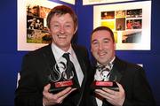 18 February 2011; Sportsfile staff photographers David Maher, left, from Kilcock, Co. Kildare, and Brendan Moran, from Tralee Co. Kerry, with their awards at the Press Photographers Association of Ireland -  AIB Photojournalism Awards 2011. David Maher won 2nd place in the Sports Portfolio category with the judges citation reading &quot;The photographer demonstrates how shooting against the light can on occasion pay-off very well; throughout there is great use of light and great observation.&quot; Brendan Moran won 2nd place in the Environmental category with a picture titled &quot;Snow Seats&quot; a view of empty seats in Croke Park stadium covered in snow during the recent bad weather in December last, with the judges citation reading &quot;The absence of people helps tell the story in a very graphic way while keeping the image simple and powerful. The strength of the picture comes from its very simplicity.&quot; This year, over 2,010 images were entered by 123 photographers from around the country, across nine categories - news, daily life, sports action, sports portfolio, portrait, environment, politics, arts & entertainment and reportage. The AIB Photojournalism Exhibition, featuring 122 prints, opens in AIB Bank, Cornelscourt, on Tuesday, 22nd February 2011. It will then go on tour, visiting selected AIB branches and other venues nationwide. Masterclasses for schools, camera clubs and photography students will also be held in locations throughout the country over the coming months. Burlington Hotel, Dublin. Picture credit: Ray McManus / SPORTSFILE