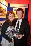 18 February 2011; Sportsfile staff photographer David Maher and his wife Elaine, from Kilcock, Co. Kildare, with his award at the Press Photographers Association of Ireland -  AIB Photojournalism Awards 2011. David won 2nd place in the Sports Portfolio category with the judges citation reading &quot;The photographer demonstrates how shooting against the light can on occasion pay-off very well; throughout there is great use of light and great observation.&quot; This year, over 2,010 images were entered by 123 photographers from around the country, across nine categories - news, daily life, sports action, sports portfolio, portrait, environment, politics, arts & entertainment and reportage. The AIB Photojournalism Exhibition, featuring 122 prints, opens in AIB Bank, Cornelscourt, on Tuesday, 22nd February 2011. It will then go on tour, visiting selected AIB branches and other venues nationwide. Masterclasses for schools, camera clubs and photography students will also be held in locations throughout the country over the coming months. Burlington Hotel, Dublin. Picture credit: Ray McManus / SPORTSFILE