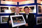 18 February 2011; Sportsfile staff photographer Oliver McVeigh, left, from Donoughmore, Co. Tyrone, with MC Des Cahill of RTÉ, and his photograph titled &quot;Heading for Victory&quot; which was shortlisted for the AIB Photojournalism Exhibition. The photograph is boxer Paul McCloskey celebrating retaining his European Light Welterweight title following victory over Brian Morrison with the referee stopping the fight in the 7th round. This year, over 2,010 images were entered by 123 photographers from around the country, across nine categories - news, daily life, sports action, sports portfolio, portrait, environment, politics, arts & entertainment and reportage. The AIB Photojournalism Exhibition, featuring 122 prints, opens in AIB Bank, Cornelscourt, on Tuesday, 22nd February 2011. It will then go on tour, visiting selected AIB branches and other venues nationwide. Masterclasses for schools, camera clubs and photography students will also be held in locations throughout the country over the coming months. Burlington Hotel, Dublin. Picture credit: Ray McManus / SPORTSFILE