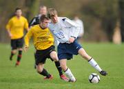 21 February 2011; Anthony Costigan, DCU, in action against Keith Walsh, NUI Maynooth. Dublin Bus Collingwood Cup 2011, DCU v NUI Maynooth, Santry Avenue, Dublin. Picture credit: Barry Cregg / SPORTSFILE