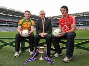 22 February 2011; Pictured at the launch of the Cadbury GAA Football U21 All-Ireland Championship in Croke Park are footballers Aidan Walsh, right, Cork, and Dermot Molloy, Donegal, with Uachtarán CLG Criostóir Ó Cuana. Cadbury are delighted to announce that Kerry legend Darragh O Sé will be added to the judging panel for this year’s Hero of the Future Awards which recognise the outstanding talent of the Cadbury GAA U21 Championship. Past winners of the award include Keith Higgins, Mayo, Fintan Goold, Cork, Killian Young, Kerry, Colm O’Neill, Cork, and Rory O’Carroll, Dublin. For more details log onto www.cadburygaau21.com or join Cadbury GAA Football on facebook. Cadbury GAA Under 21 Football Launch, Croke Park, Dublin. Picture credit: David Maher / SPORTSFILE