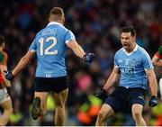 1 October 2016; Michael Darragh Macauley, right, celebrates with team-mate Ciarán Kilkenny after the GAA Football All-Ireland Senior Championship Final Replay match between Dublin and Mayo at Croke Park in Dublin. Photo by Piaras Ó Mídheach/Sportsfile