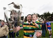 9 October 2016; David Cunningham of Glen Rovers celebrates with his son Diarmuid, aged 2, after winning the Cork County Senior Hurling Championship Final match between Erin's Own and Glen Rovers at Páirc Ui Rinn in Cork. Photo by Diarmuid Greene/Sportsfile