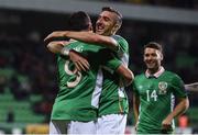 9 October 2016; Shane Long of Republic of Ireland celebrates after scoring his side's first goal with team mate Stephen Ward during the FIFA World Cup Group D Qualifier match between Moldova and Republic of Ireland at Stadionul Zimbru in Chisinau, Moldova. Photo by David Maher/Sportsfile