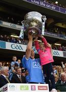 1 October 2016; Eoghan O'Gara of Dublin along with his daughter Ellia lift the Sam Maguire cup after the GAA Football All-Ireland Senior Championship Final Replay match between Dublin and Mayo at Croke Park in Dublin. Photo by Ray McManus/Sportsfile