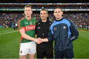 1 October 2016; Mayo captain Cillian O'Connor shakes hands with Dublin captain Stephen Cluxton in the presence of referee Maurice Deegan ahead of the GAA Football All-Ireland Senior Championship Final Replay match between Dublin and Mayo at Croke Park in Dublin. Photo by Ray McManus/Sportsfile