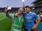 1 October 2016; Kevin McManamon of Dublin gets a selfie with Fergus McNally after the GAA Football All-Ireland Senior Championship Final Replay match between Dublin and Mayo at Croke Park in Dublin. Photo by Ray McManus/Sportsfile