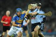 19 February 2011; James Woodlock, Tipperary, in action against Declan O'Dwyer, Dublin. Allianz Hurling League, Division 1 Round 2, Dublin v Tipperary, Croke Park, Dublin. Picture credit: Ray McManus / SPORTSFILE