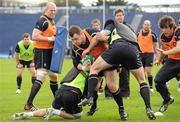 23 February 2011; Ireland's Cian Healy is tackled by Paddy Wallace and Tommy Bowe during squad training ahead of their RBS Six Nations Rugby Championship match against Scotland on Sunday. Ireland Rugby Squad Training, RDS, Ballsbridge, Dublin. Picture credit: Brendan Moran / SPORTSFILE