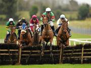 23 February 2011; Chaperoned, with Robbie Power up, jumps the last ahead of eventual winner Little Green, right, with Paul Paul Townend up, and Fearless Falcon, left, with Andrew Lynch up, during the Winning Fair Juvenile Hurdle. Fairyhouse Racecourse, Fairyhouse, Co. Meath. Picture credit: Barry Cregg / SPORTSFILE