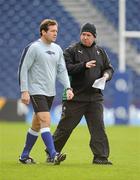23 February 2011; Ireland head coach Declan Kidney in conversation with referee Alain Rolland during squad training ahead of their RBS Six Nations Rugby Championship match against Scotland on Sunday. Ireland Rugby Squad Training, RDS, Ballsbridge, Dublin. Picture credit: Brendan Moran / SPORTSFILE