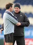 23 February 2011; Ireland head coach Declan Kidney in conversation with referee Alain Rolland during squad training ahead of their RBS Six Nations Rugby Championship match against Scotland on Sunday. Ireland Rugby Squad Training, RDS, Ballsbridge, Dublin. Picture credit: Brendan Moran / SPORTSFILE