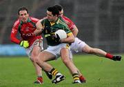 20 February 2011; Aidan O'Mahony, Kerry, in action against Mark Ronaldson and Alan Dillon, left, Mayo. Allianz Football League, Division 1 Round 2, Mayo v Kerry, McHale Park, Castlebar, Co. Mayo. Picture credit: Brian Lawless / SPORTSFILE