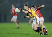 23 February 2011; Liam Og McGovern, Wexford, in action against Eamonn O'Neill, Louth. Cadbury Leinster Under 21 Football Quarter-Final, Wexford v Louth, Belfield, Enniscorthy, Co. Wexford. Picture credit: Matt Browne / SPORTSFILE