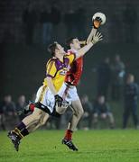23 February 2011; Michael Rogers, Louth, in action against Matthew O'Hanlon, Wexford. Cadbury Leinster Under 21 Football Quarter-Final, Wexford v Louth, Belfield, Enniscorthy, Co. Wexford. Picture credit: Matt Browne / SPORTSFILE