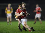 23 February 2011; Kevin Rogers, Louth, in action against Michael Furlong, Wexford. Cadbury Leinster Under 21 Football Quarter-Final, Wexford v Louth, Belfield, Enniscorthy, Co. Wexford. Picture credit: Matt Browne / SPORTSFILE