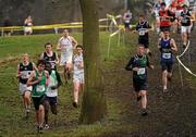 16 February 2011; Athletes during the Senior Boys event negotiate a tree in the course at the Aviva Leinster Schools Cross Country. Santry Demesne, Santry, Dublin. Picture credit: Stephen McCarthy / SPORTSFILE