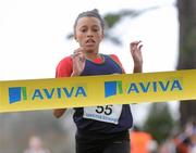16 February 2011; A general view of Aviva branding as Nadia Elton Power, St MacDara’s CC, crosses the line to win the Minor Girls event at the Aviva Leinster Schools Cross Country. Santry Demesne, Santry, Dublin. Picture credit: Stephen McCarthy / SPORTSFILE