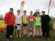 16 February 2011; Podium finishers, from left, Brian O'Malley, Castleknock C.C., fourth place, Cillian O’Maonigh, Colaiste Eoin, third place, Aaron Hughes, St Mary’s Drogheda, first place, and Shane Fitzsimons, St Joseph’s Rochfortbridge, second place, with Fr. Ailibe O'Murchu OFM, President of the Leinster Schools' Athletics Union, left, and John Foley, Chief Executive Athletics Ireland, following the Intermediate Boys event at the Aviva Leinster Schools Cross Country. Santry Demesne, Santry, Dublin. Picture credit: Stephen McCarthy / SPORTSFILE