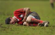 7 February 2011; Adam McCarthy, CUS, lies injured during the second half. Fr Godfrey Cup Quarter-Final Replay, CUS v Presentation College Bray, St. Columba’s College, Whitechurch, Dublin. Picture credit: Stephen McCarthy / SPORTSFILE