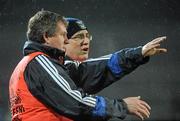 9 February 2011; Cavan joint managers, Val Andrews, right, and Terry Hyland chat over tactics on the sideline. Barrett Sports Lighting Dr. McKenna Cup Semi-Final, Tyrone v Cavan, Brewster Park, Enniskillen, Co. Fermanagh. Picture credit: Oliver McVeigh / SPORTSFILE
