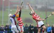 25 February 2011; Patrick Cronin, University of Limerick, in action against Colin Fennelly and Tony Murphy, Cork IT. Ulster Bank Fitzgibbon Cup Semi-Final, Cork IT v University of Limerick, Waterford Institute of Technology, Cork Road, Waterford. Picture credit: Matt Browne / SPORTSFILE