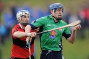 25 February 2011; Conor Cooney, Limerick IT, in action against Luke O'Farrell, University College Cork. Ulster Bank Fitzgibbon Cup Semi-Final, Limerick IT v University College Cork, Waterford Institute of Technology, Cork Road, Waterford. Picture credit: Matt Browne / SPORTSFILE