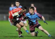 25 February 2011; Ryan Devlin, St. Patrick's Academy, Dungannon, in action against Rory Brennan, St. Michael's, Enniskillen. BT MacRory Cup Semi-Final, St. Patrick's Academy, Dungannon v St. Michael's, Enniskillen, Healy Park, Omagh, Co. Tyrone. Picture credit: Oliver McVeigh / SPORTSFILE