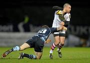 25 February 2011; Ian Humphreys, Ulster, is tackled by Gavin Evans, Cardiff Blues. Celtic League, Ulster v Cardiff Blues, Ravenhill Park, Belfast, Co. Antrim. Photo by Sportsfile