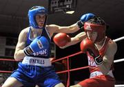 25 February 2011; Michael Conlan, St. John's Bosco Boxing Club, exchanges punches with Cristopher Phelan, right, Ryston Boxing Club, during their 52kg division bout. National Boxing Championship Finals, National Stadium, Dublin. Picture credit: David Maher / SPORTSFILE