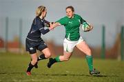 26 February 2011; Niamh Briggs, Ireland, is tackled by Lauren Harris, Scotland. Women's Six Nations Rugby Championship, Scotland v Ireland, Lasswade, Edinburgh, Scotland. Picture credit: Stephen McCarthy / SPORTSFILE
