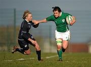 26 February 2011; Mairead Kelly, Ireland, is tackled by Lauren Harris, Scotland. Women's Six Nations Rugby Championship, Scotland v Ireland, Lasswade, Edinburgh, Scotland. Picture credit: Stephen McCarthy / SPORTSFILE